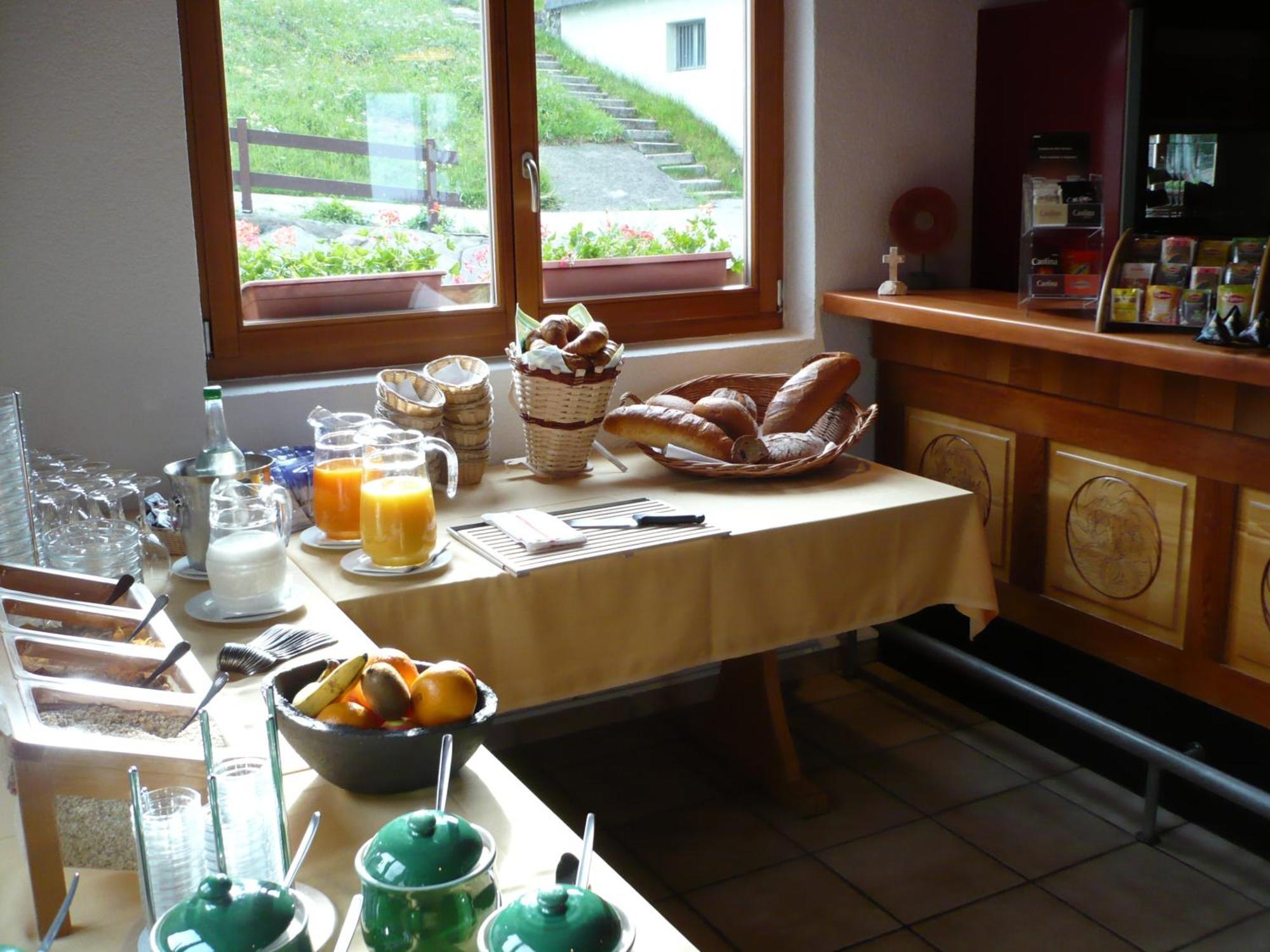 Hotel Bellwald Restaurante foto